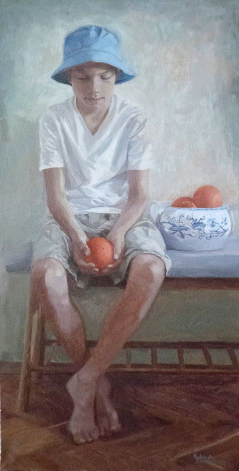 Boy with oranges